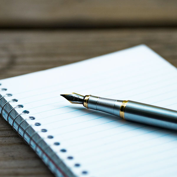 Writing in a notebook